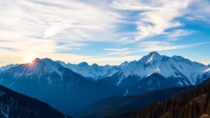 Mountain landscape with snow-capped peaks at sunrise, vibrant blue sky, forested valleys below, photorealistic travel photography