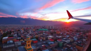 Aerial view of La Paz Bolivia with colorful buildings and mountain valley landscape at sunrise, vibrant cityscape from airplane window perspective
