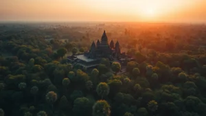 Aerial view of Angkor Wat temple complex surrounded by dense jungle canopy at sunrise with golden light, photorealistic, no text