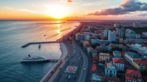 Aerial view of Montevideo coastline at sunset with colorful colonial buildings and harbor, photorealistic travel photography